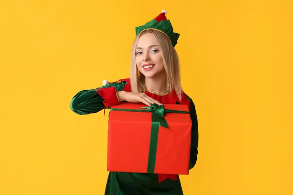 Happy Young Woman Elf Costume Christmas Gift Box Yellow Background — Stock Photo, Image