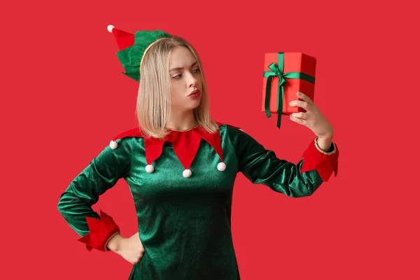 Young Woman Elf Costume Christmas Gift Box Red Background — Stock Photo, Image