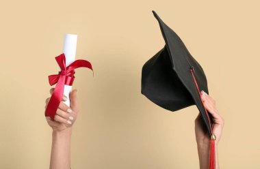 Woman with graduation hat and diploma on yellow background clipart