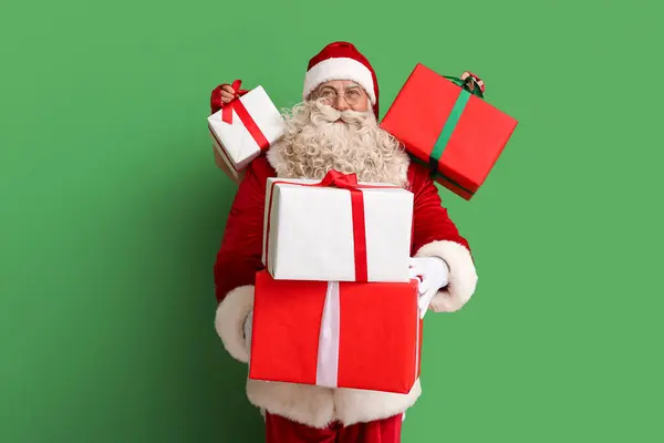 Santa Claus Vánoční Dárky Zeleném Pozadí — Stock fotografie