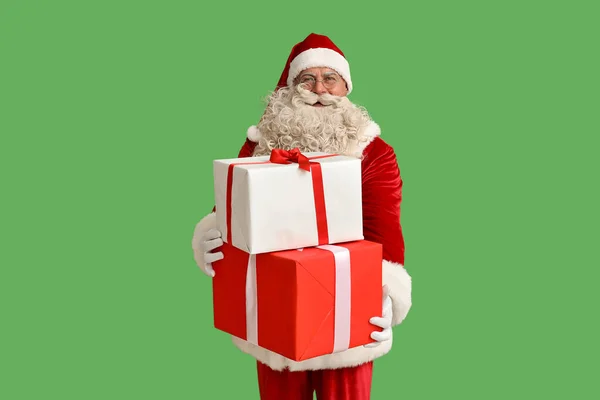 Santa Claus Vánoční Dárky Zeleném Pozadí — Stock fotografie