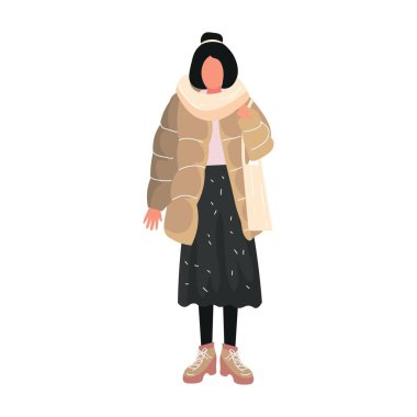 Beyaz arka planda kışın giyinmiş şık bir kadın.