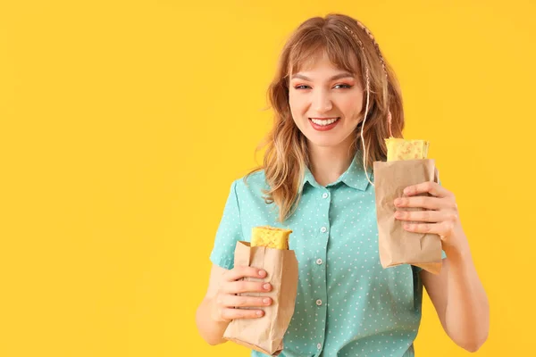 Young Woman Tasty Sandwich Wraps Yellow Background — Stock Photo, Image