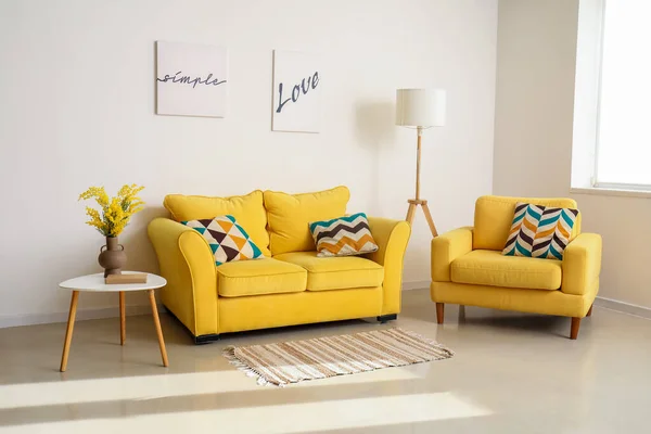 Interior of modern room with yellow sofa