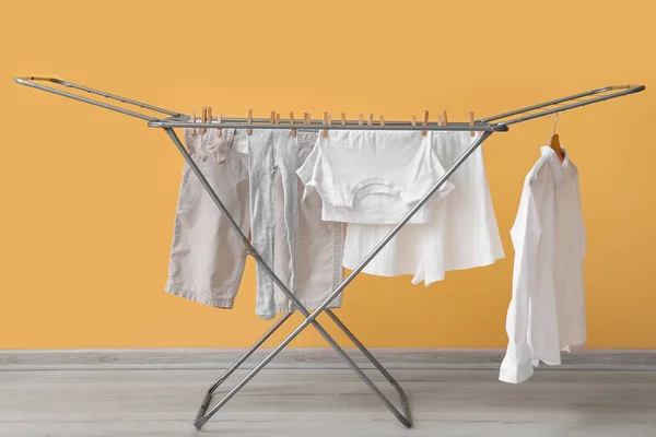 Clean Clothes Hanging Dryer Yellow Wall — Stock Photo, Image