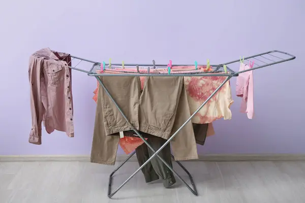 Clean Clothes Hanging Dryer Lilac Wall — Stock Photo, Image