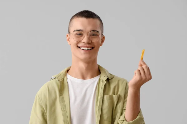 Young Man French Fries Light Background — Stock Photo, Image