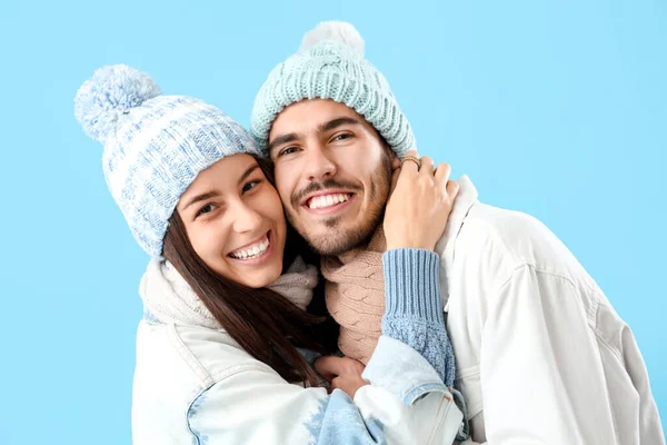 Loving Couple Winter Clothes Hugging Blue Background Closeup — Stock Photo, Image