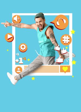 Mavi arka planda dans eden genç erkek blogcu