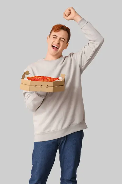 Happy Young Man Holding Cardboard Box Tasty Pizza White Background — Stock Photo, Image