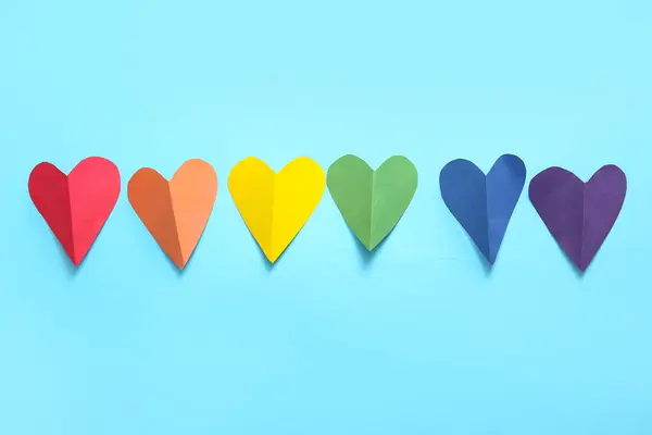 Цветные Бумажные Сердечки Голубом Фоне Концепция Лгбт — стоковое фото