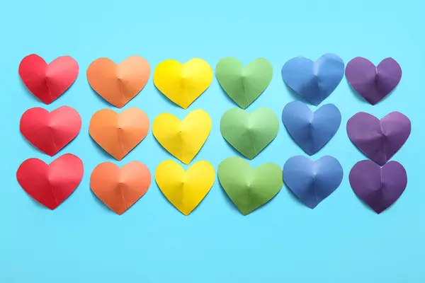 Цветные Бумажные Сердечки Голубом Фоне Концепция Лгбт — стоковое фото