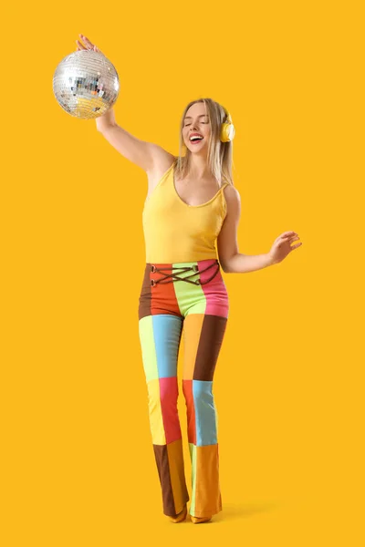 Pretty Young Woman Disco Ball Enjoying Music Yellow Background — Stock Photo, Image