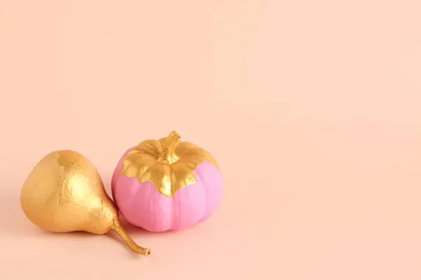 Pink Painted Pumpkin Golden Pear Orange Background — Stock Photo, Image