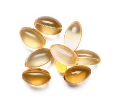 Beyaz arka planda balık yağı hapları