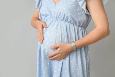 Açık renkli, closeup hamile kadın