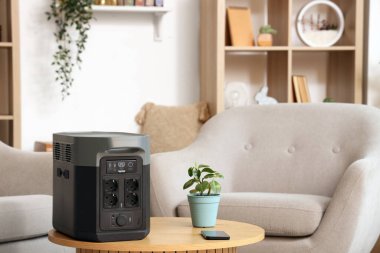 Portable power station on table in living room