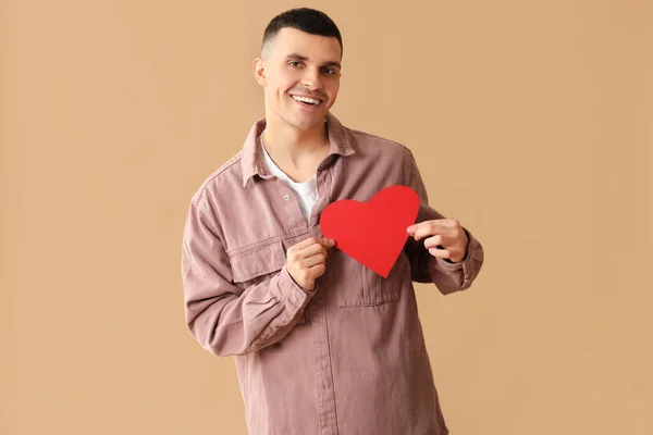 Happy Young Man Red Paper Heart Brown Background — Stock Photo, Image
