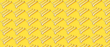 Sarı arka planda anahtarlar. Tasarım için desen