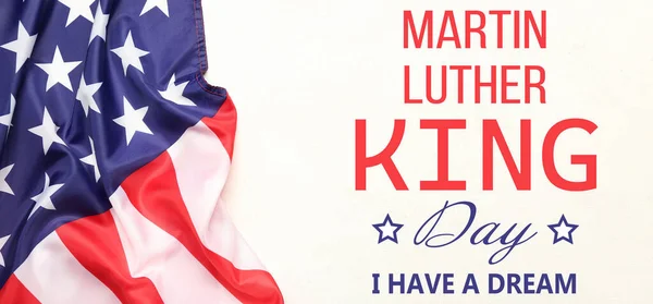 Banner for Martin Luther King Jr. Day with USA flag on light background