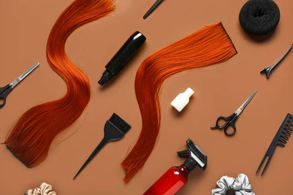 Set of hairdresser's tools on brown background