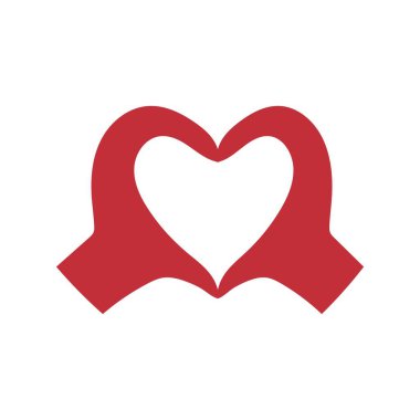 Beyaz arka planda insan elinden yapılmış bir kalp. Sevgililer Günü kutlaması