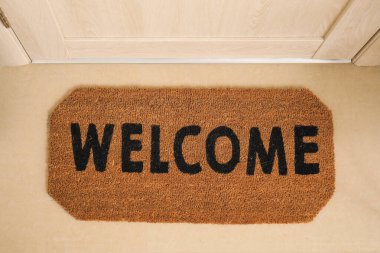 Kelime eşliğinde kapı paspası Salona hoş geldin, üst manzara