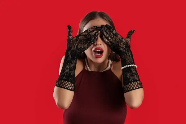 Scared Young Woman Covering Eyes Red Background — Stock Photo, Image