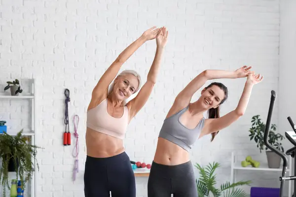 Body positive women training in gym