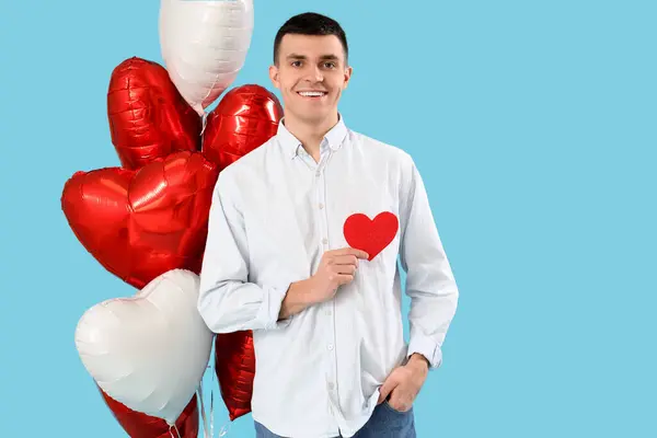 Young Man Paper Heart Balloons Blue Background Valentine Day Celebration — Stock Photo, Image