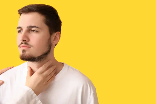 Endocrinologist Examining Thyroid Gland Young Man Yellow Background — Stock Photo, Image