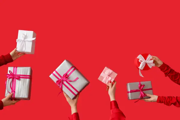 Female Hands Holding Gift Boxes Red Background Valentine Day Celebration — Stock Photo, Image