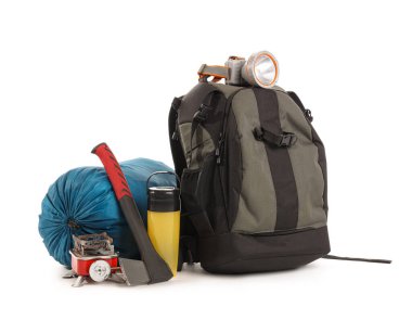 Set of camping equipment with backpack, flashlight and hatchet on white background