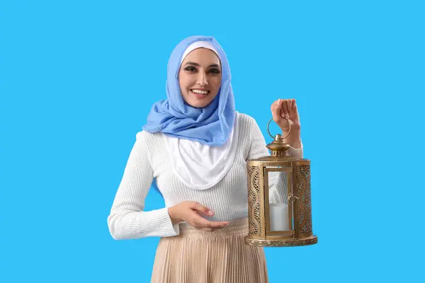 Young Muslim Woman Lantern Blue Background Islamic New Year Celebration — Stock fotografie