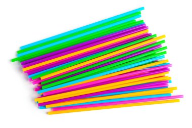 Heap of colorful plastic straws on white background