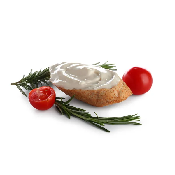 Tasty bruschetta with cream cheese and tomatoes on white background