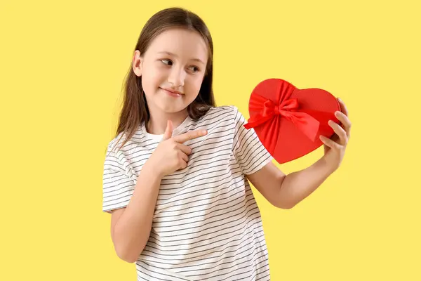 Cute Little Girl Pointing Gift Valentine Day Yellow Background — 图库照片