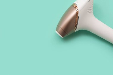 Turkuaz arkaplan üzerine modern fotoepilatör