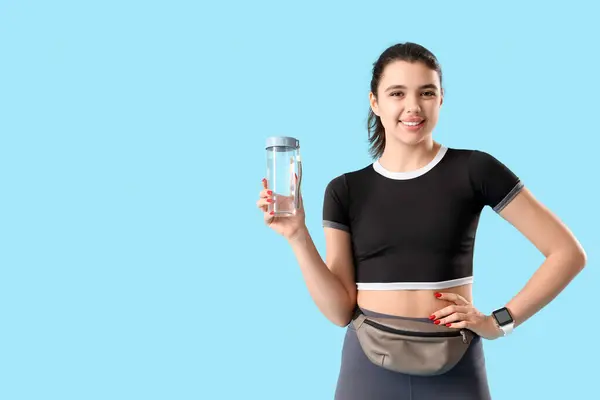 Young Woman Sportswear Water Bottle Blue Background — Stock Photo, Image