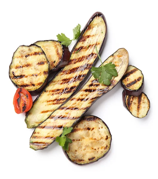 Delicious grilled eggplants and tomato on white background