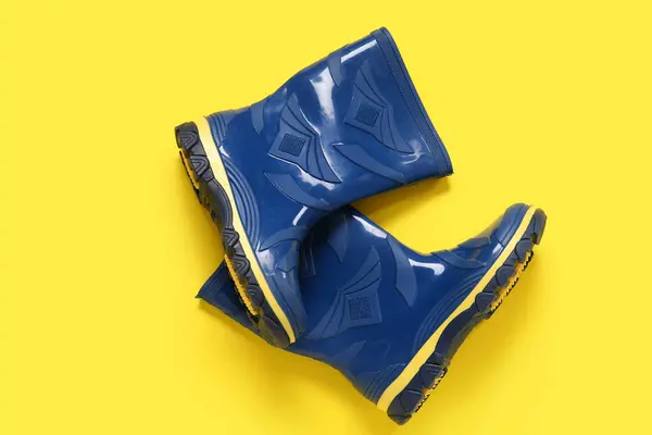 Stylish Blue Gumboots Yellow Background — Stock Photo, Image