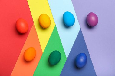 Painted Easter eggs on colorful background
