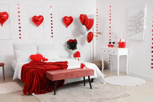 Interior of festive bedroom with decorations for Valentine\'s Day celebrations
