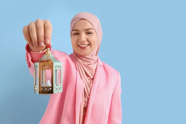 Young Muslim Woman Lamp Blue Background Ramadan Celebration — Stock Photo, Image
