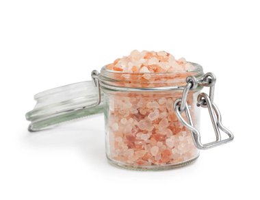 Beyaz arka planda Himalaya pembe tuzu olan kavanoz