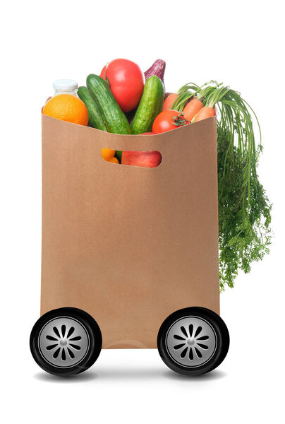 Bag of fresh products and drawn wheels on white background. Food delivery concept