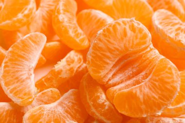 Arka plan olarak soyulmuş tatlı mandalinaların dokusu