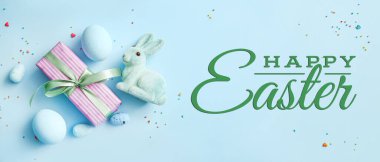 Paskalya bayrağını hediye, yumurta ve oyuncak tavşanla selamlıyorum.