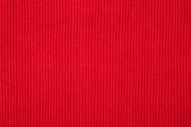 Kırmızı kumaş dokusunun arkaplan olarak yakın görünümü