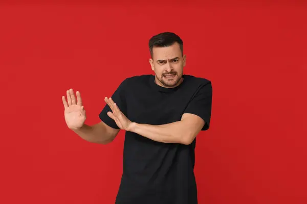 Handsome Ashamed Young Man Red Background — Stock Photo, Image